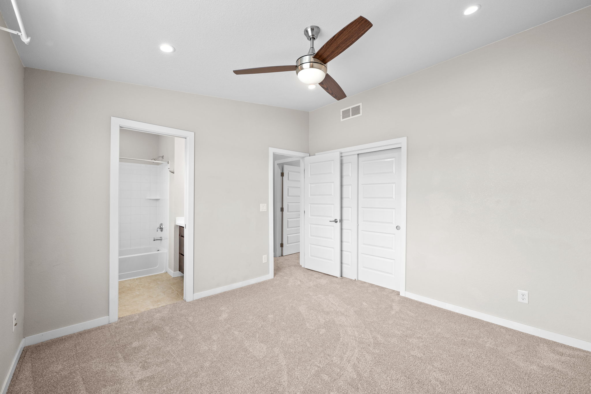 Looking towards Full Bath and Hallway from En-Suite Bedroom