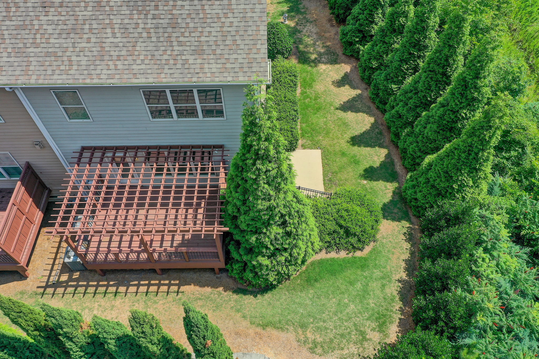 38 Aerial Exterior Rear w Deck + Side Yard