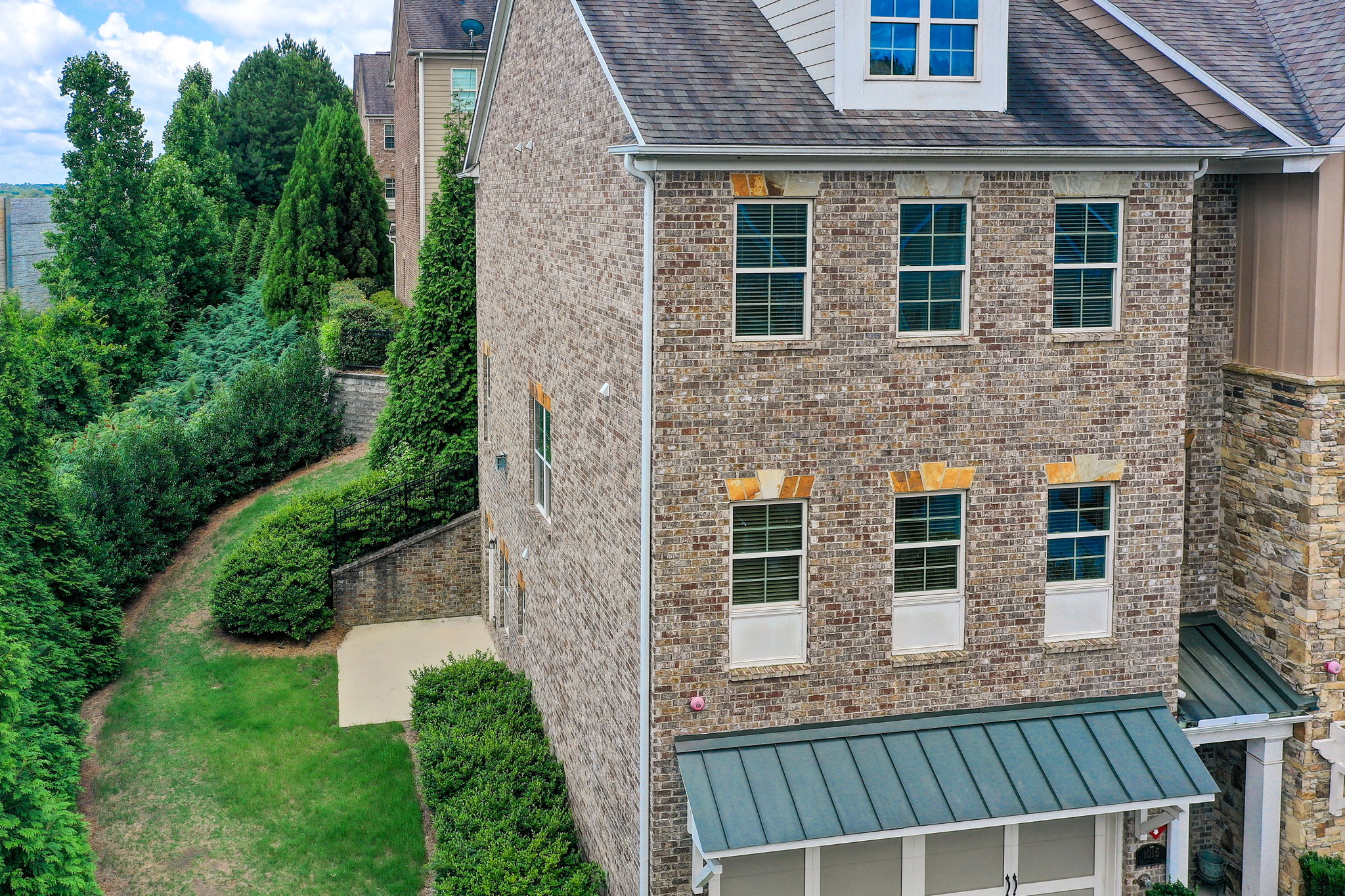 2 Aerial Exterior Side w Yard + Front Partial