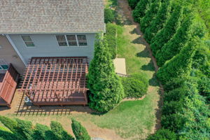 38 Aerial Exterior Rear w Deck + Side Yard