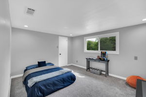 Bedrooms offer recessed lighting and walk-in closets
