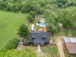 Aerial view shows off all the features of this well-equipped home