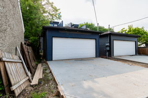 Double Detached Garage & Parking Pad