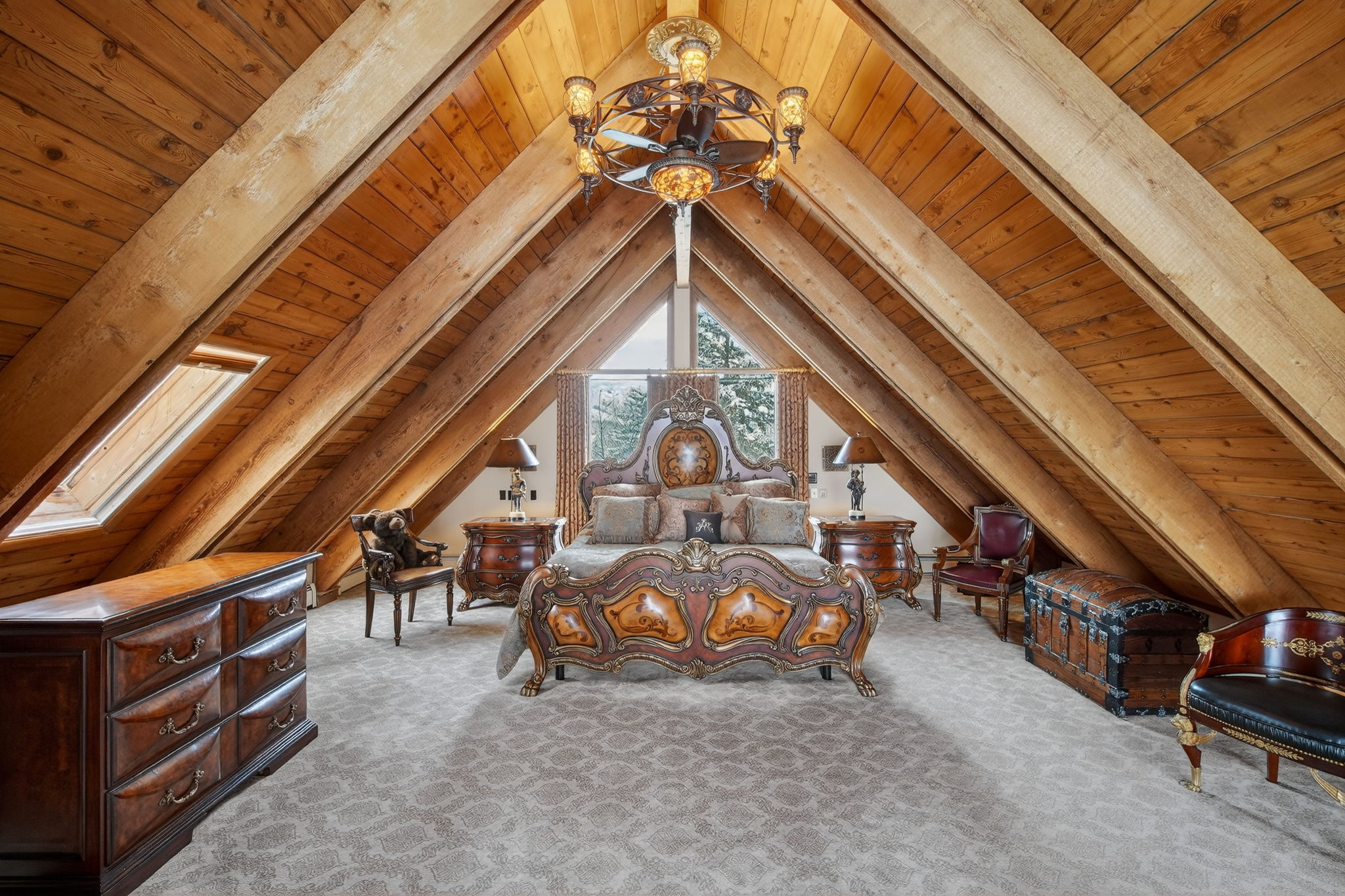 Primary retreat with sitting area and fireplace