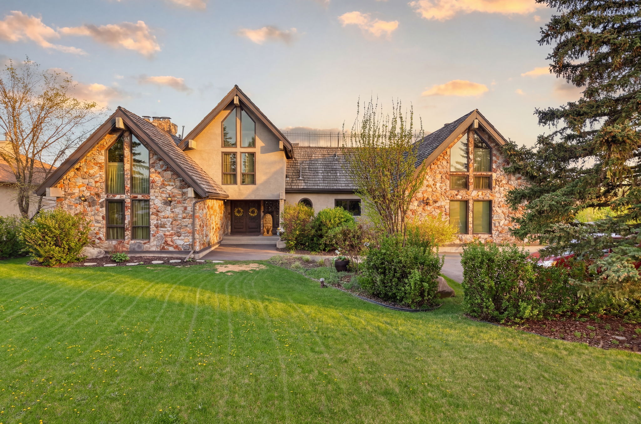 Stone-and-timber curb appeal on a 0.67-acre lot
