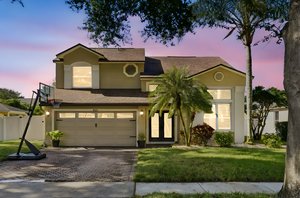 10212 Facet Ct_01 day to dusk.jpeg