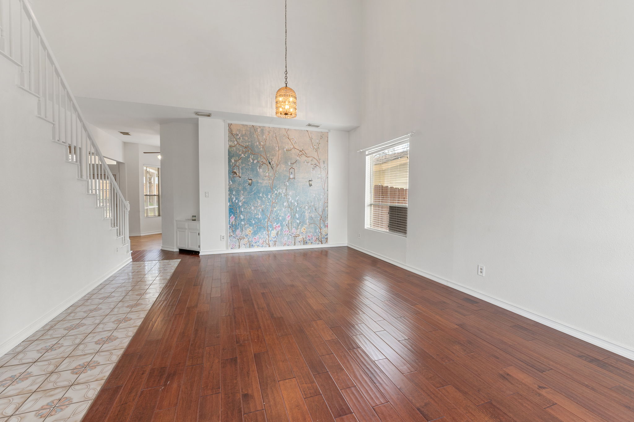 The wallpaper highlights the dining space well.