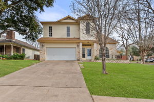 Nestled in Tanglewood Forest, this two story home  features a large lot and a home with plenty of room for everyone!