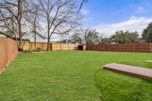 The generously sized backyard provides room for customization by its new owner.