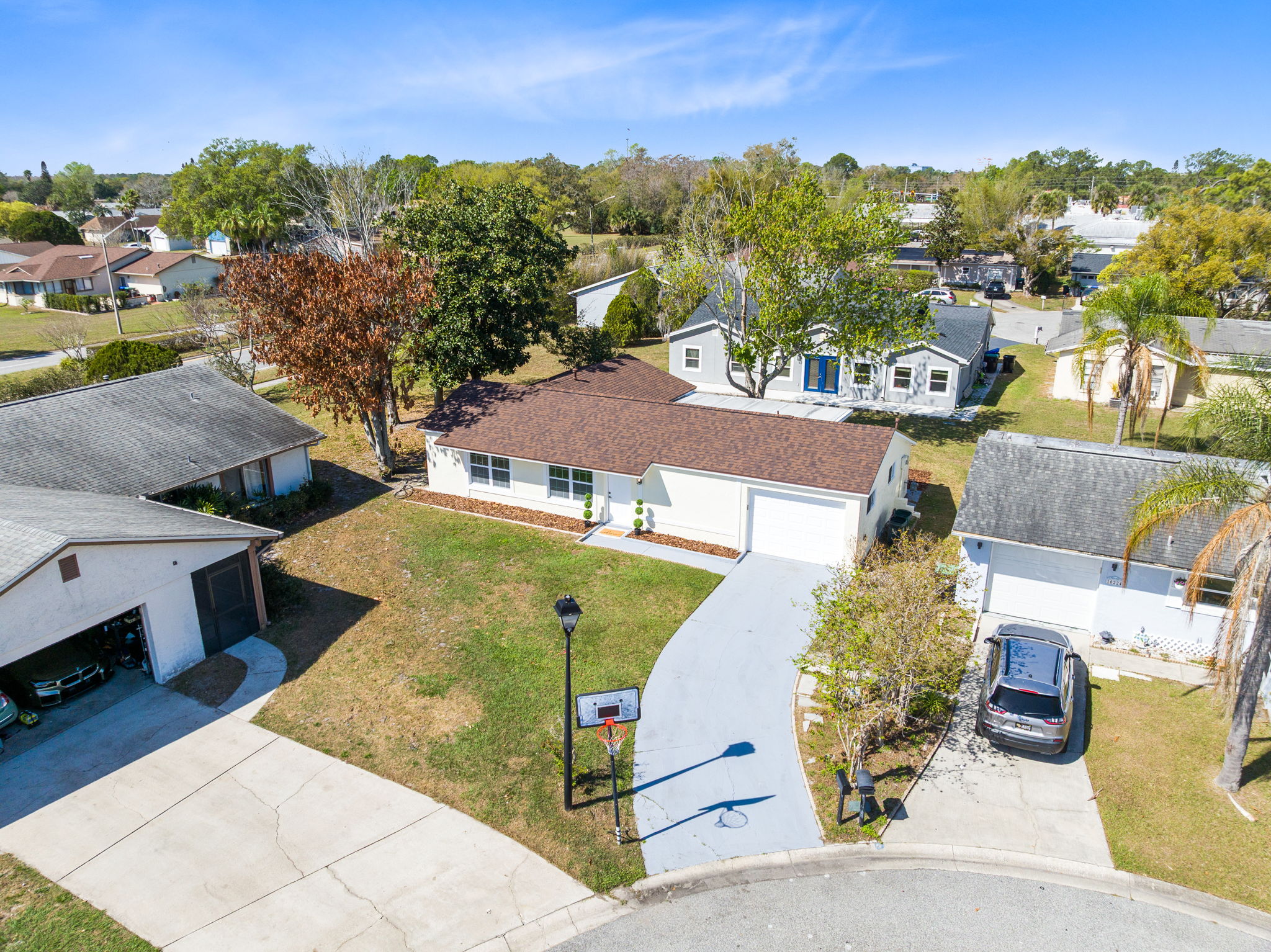 Aerial view showing the home within the neighborhood.
