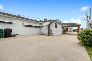 Large Concrete driveway with cover