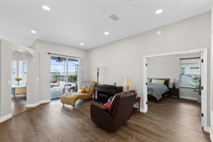 Living Room with View to Master Suite & Patio