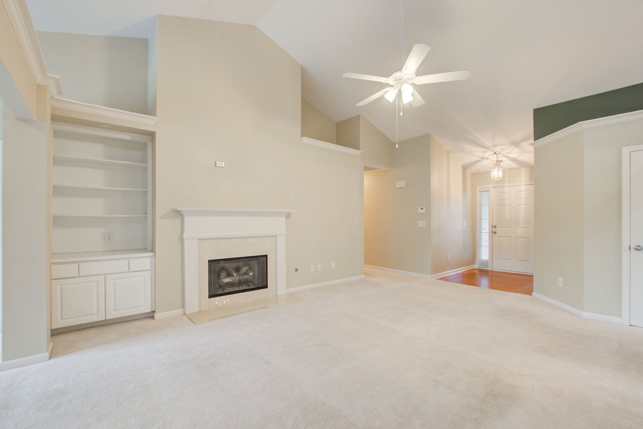 5 Living Room A w Fireplace + Entry