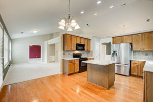 15 Kitchen D w Sunroom and LR Partial