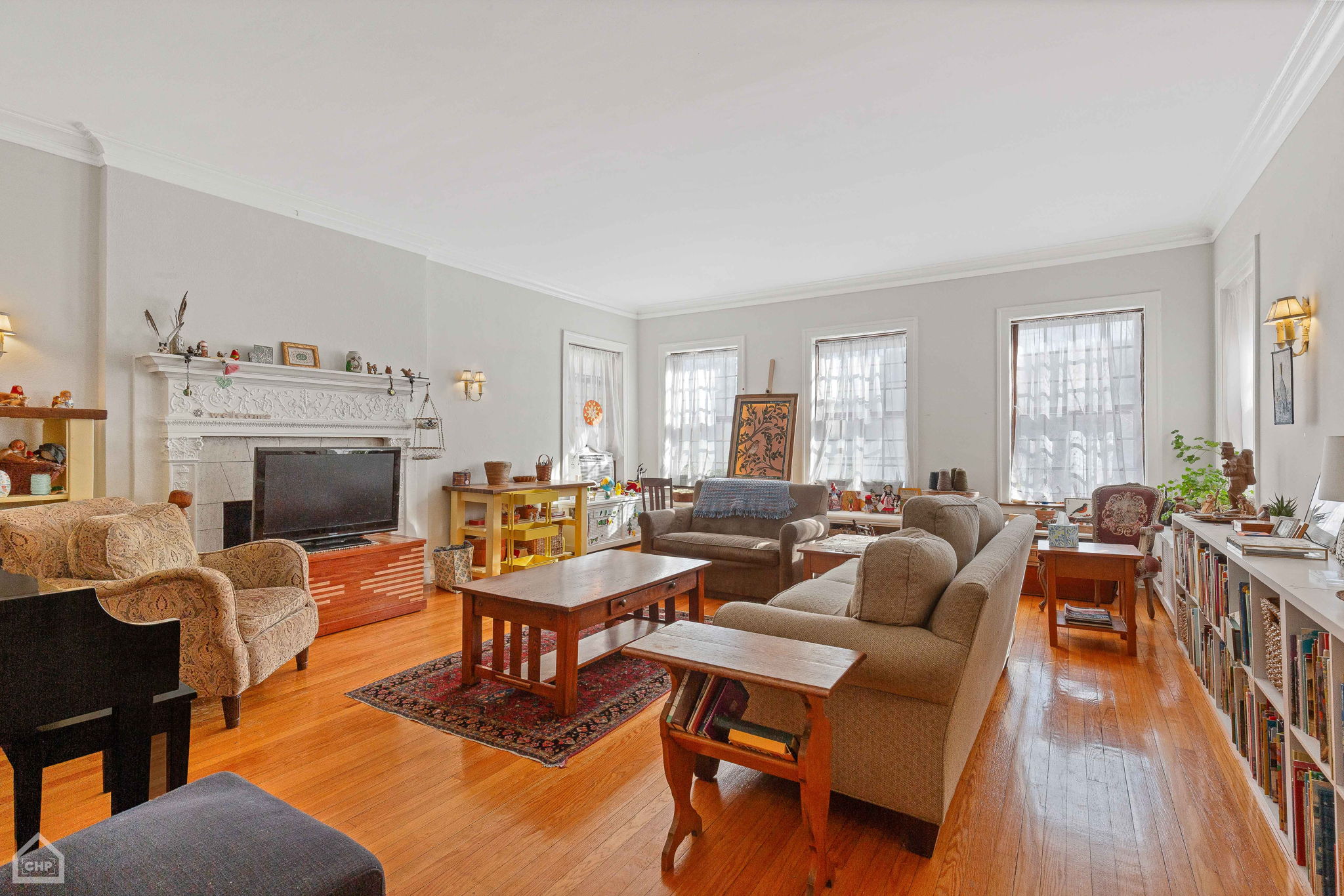 First floor living room with decorative fireplace