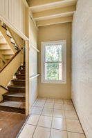 Enclosed back porch and stairwell