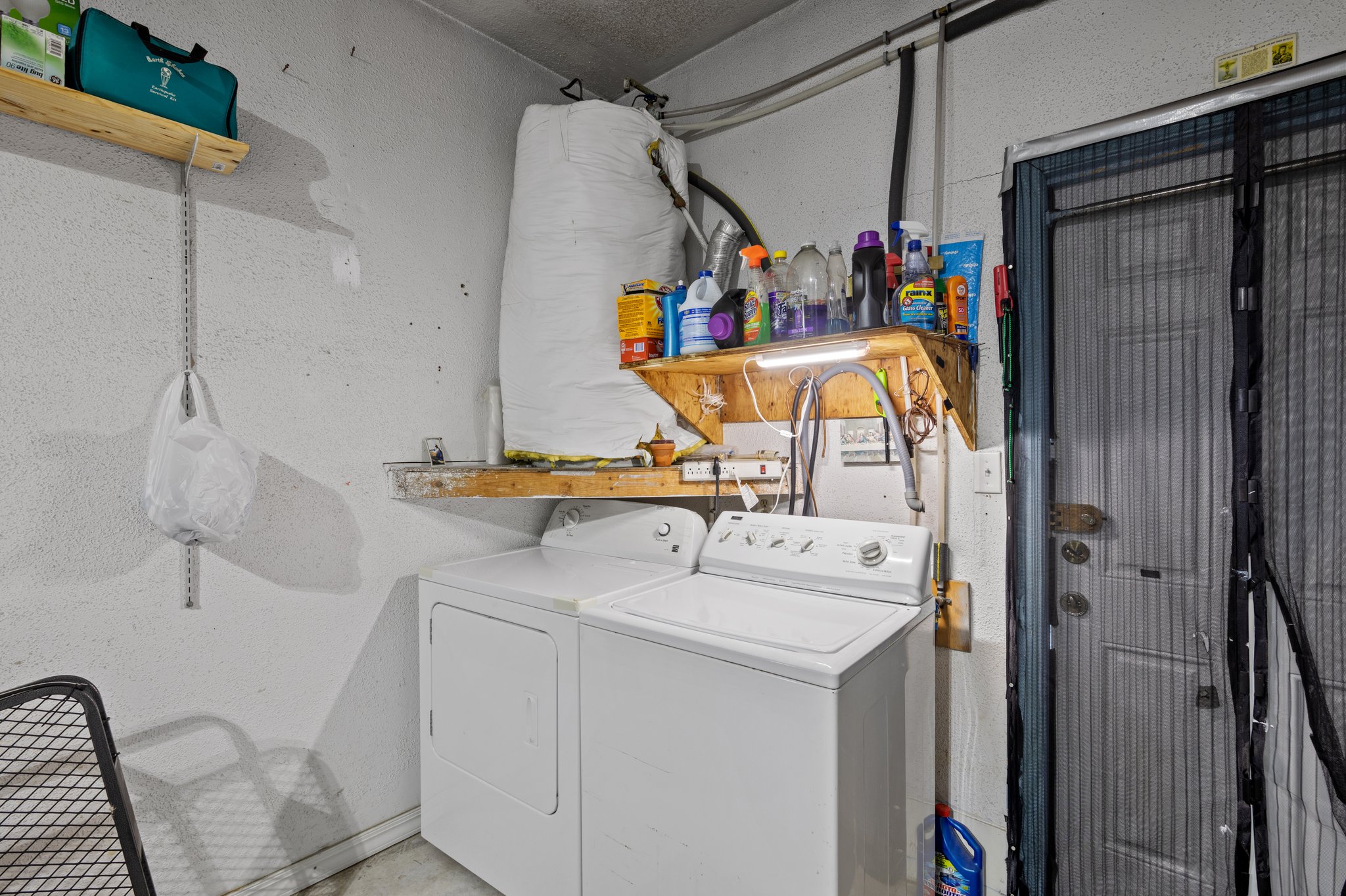 Washer/dryer in garage.