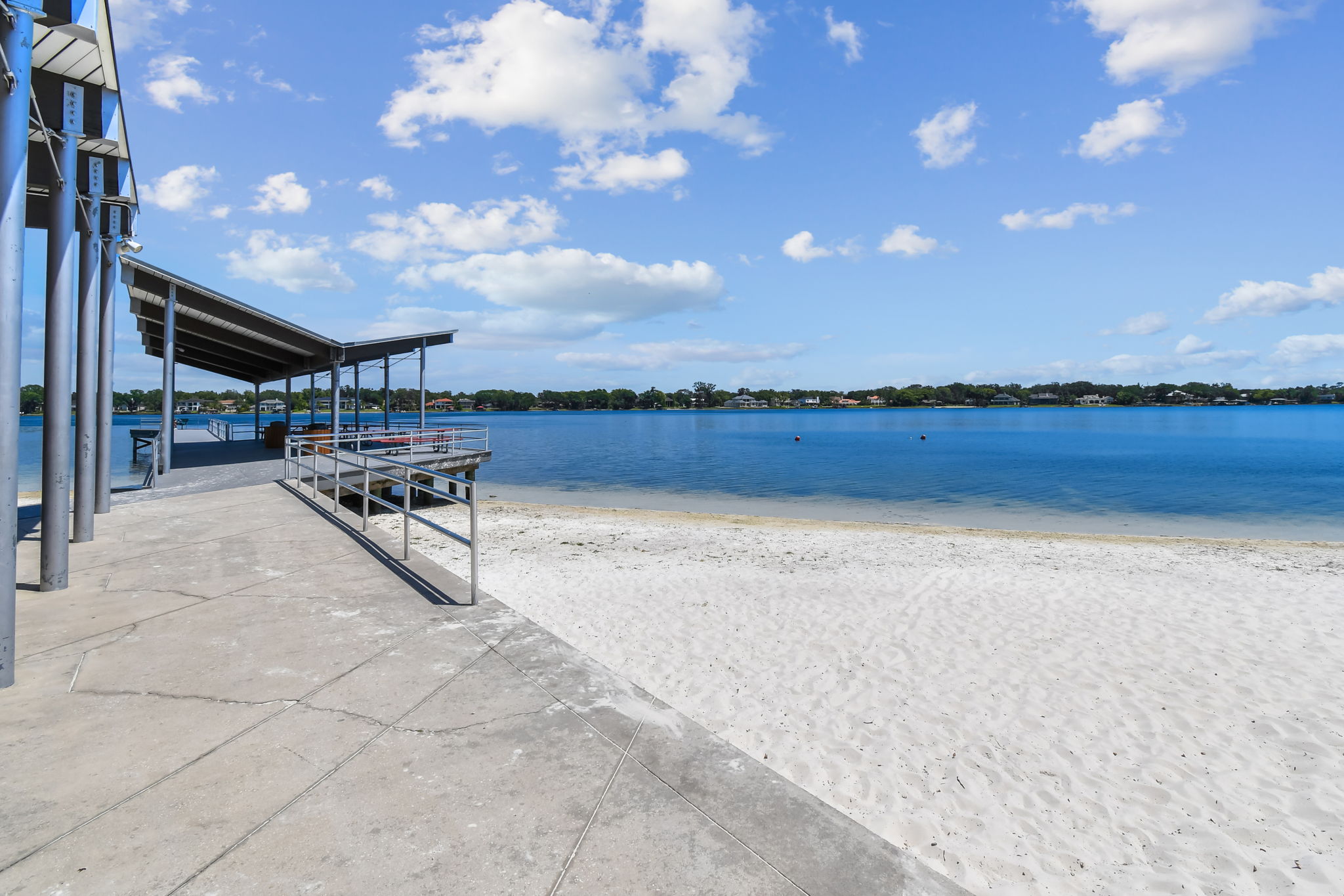 White-sand beach boardwalk and dock