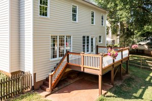 Under deck patio for storing yard tools