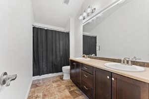 Upper Level Bathroom with High Ceiling