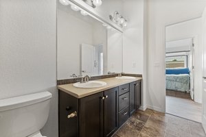 Upper Level Bathroom with High Ceiling