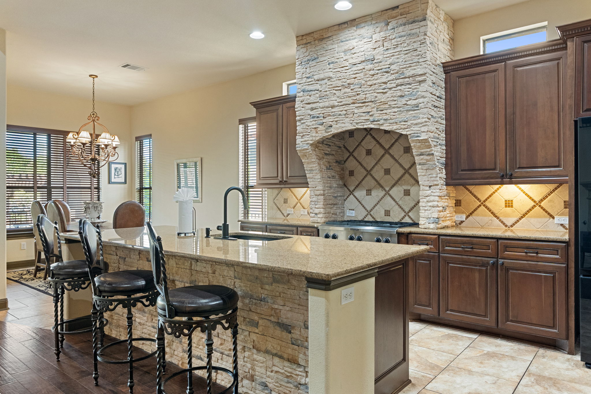 Kitchen island with stone accent