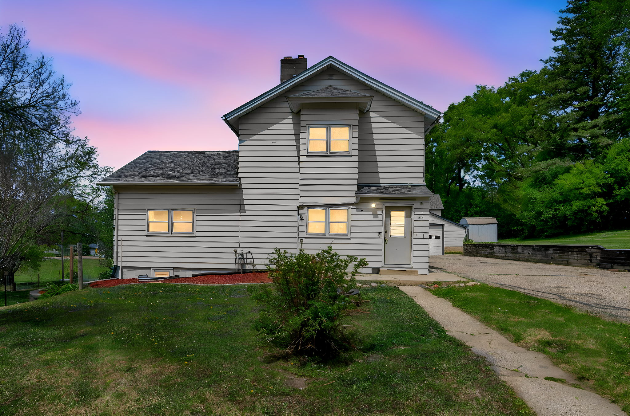 104 Frank Ave Elysian MN-2 day to dusk.jpeg