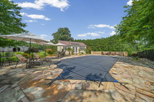 Expansive Stone Pool Deck