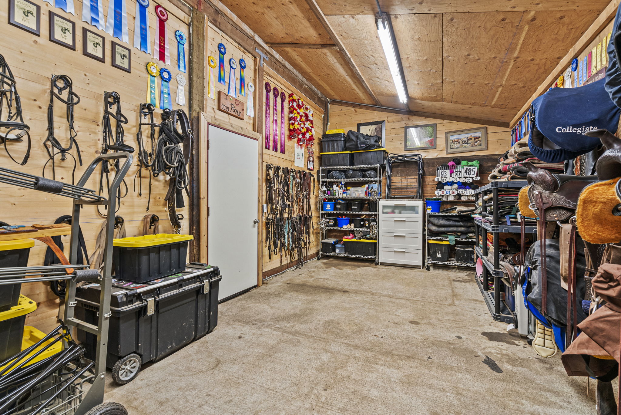 Spacious tack room designed to keep your gear clean, dry, and organized