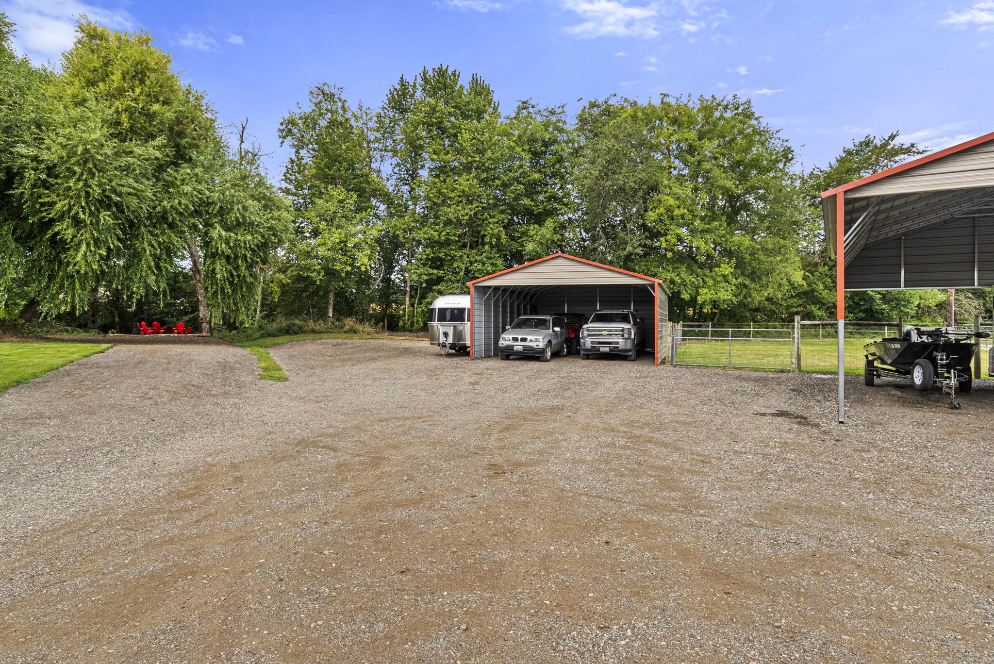 Additional parking and The back of the property opens to a quiet creekside setting, offering a beautiful place to relax and take in the natural surroundings.