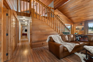 Hallway to lower level and out to barn