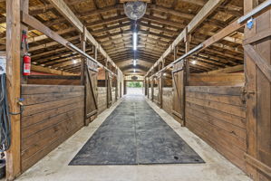 Rare attached 9-stall barn.