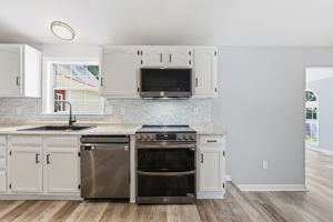 Black Stainless appliances including a double oven