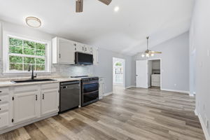 Kitchen with space for a custom island or additional cabinets