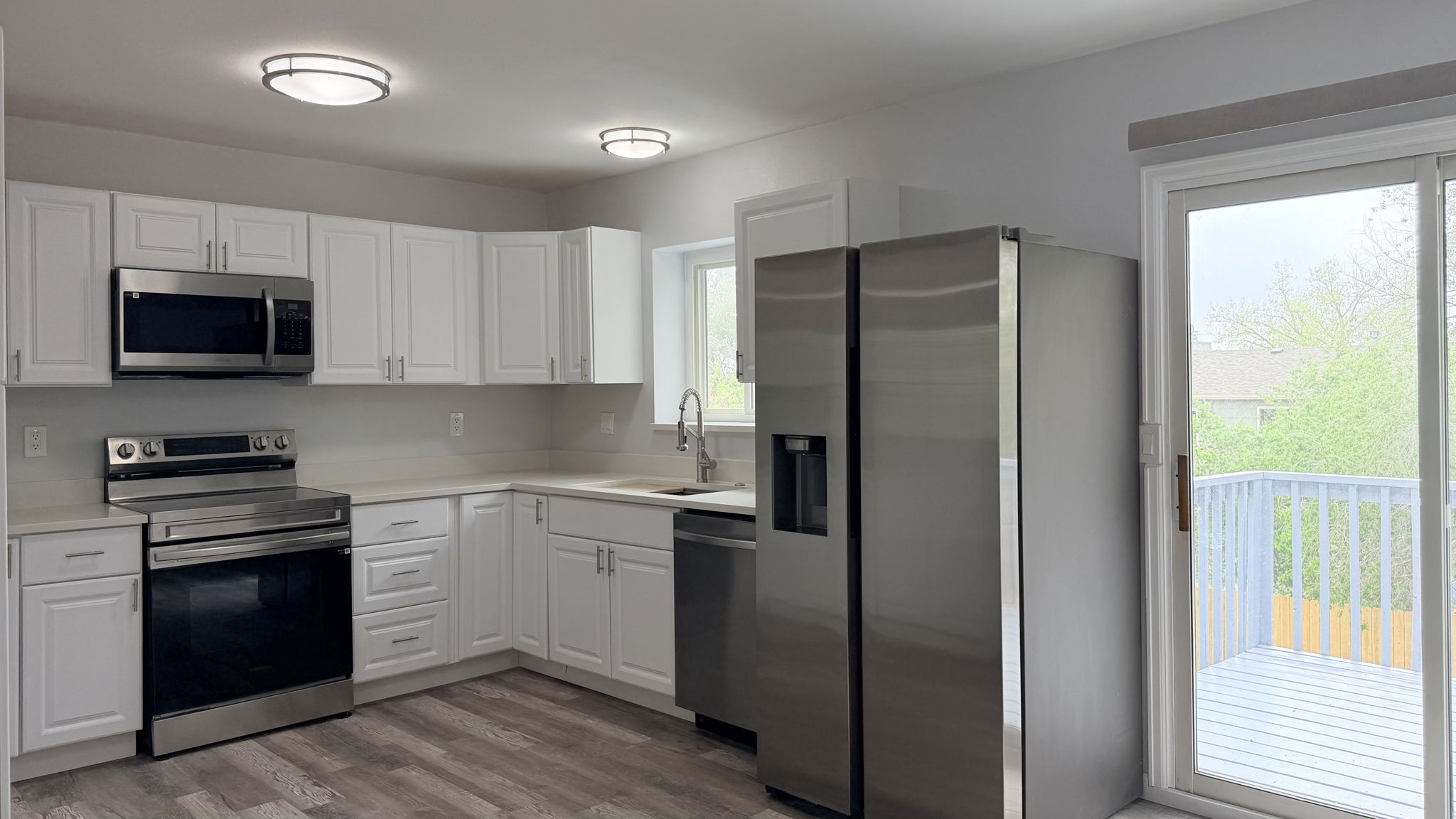 Quartz Countertops, new cupboards & appliances
