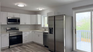 Quartz Countertops, new cupboards & appliances