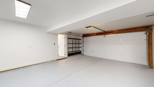 Newly finished garage with new garage door