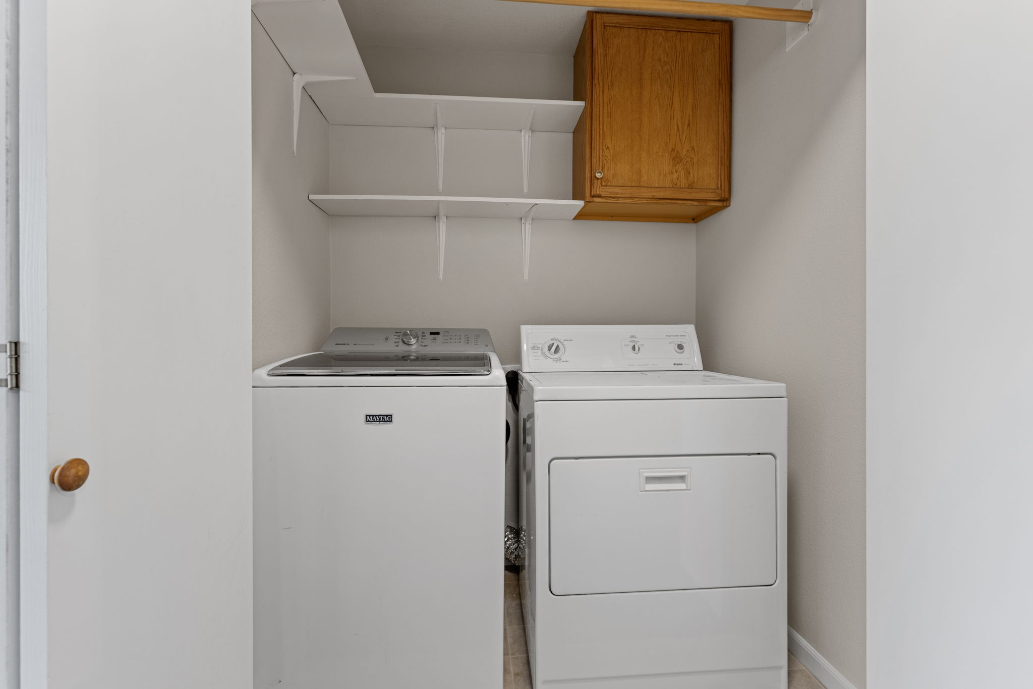 Laundry Room With Included Washer and Dryer