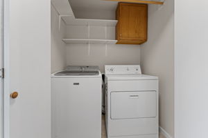 Laundry Room With Included Washer and Dryer