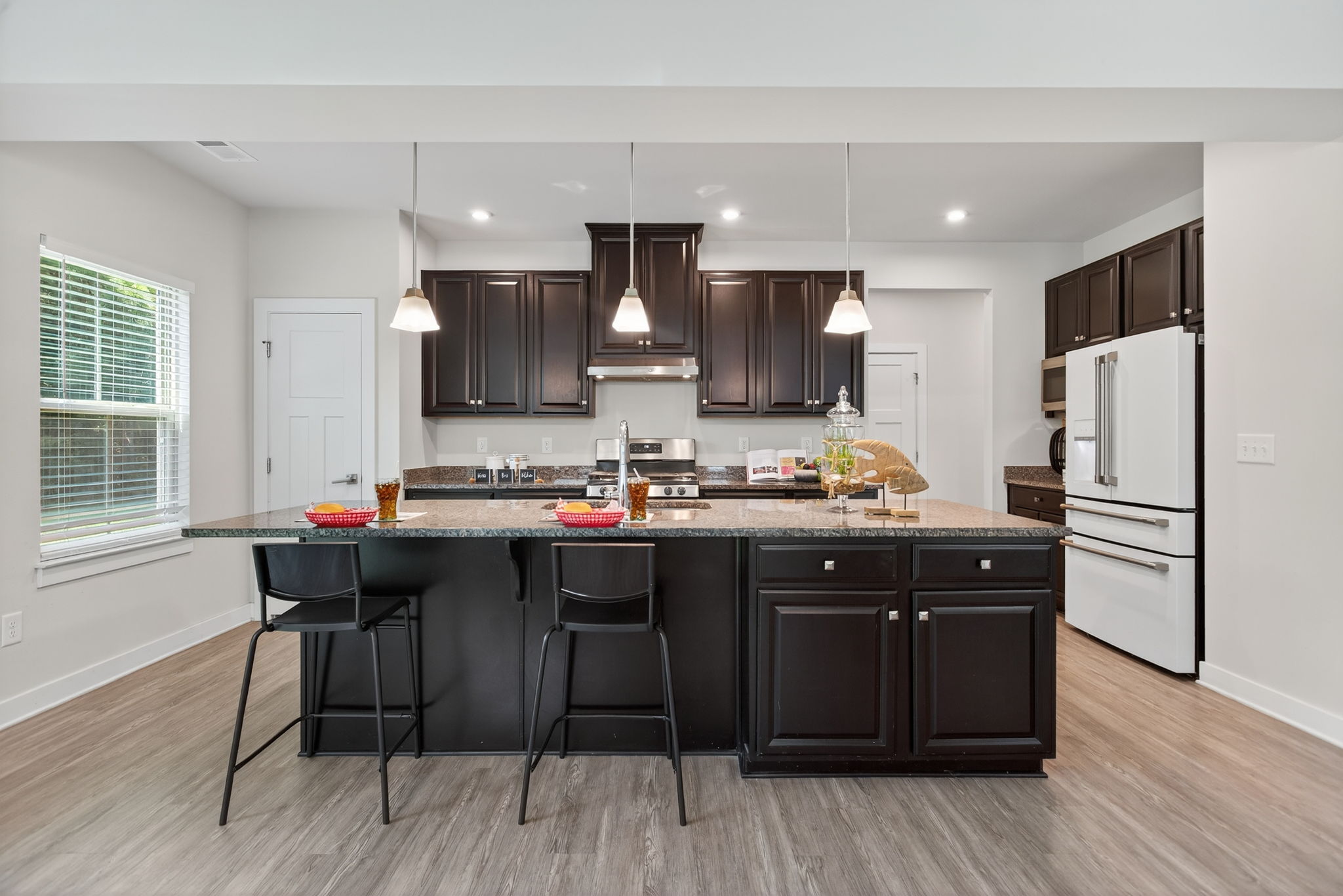Easily add 1-2 more stools for additional seating