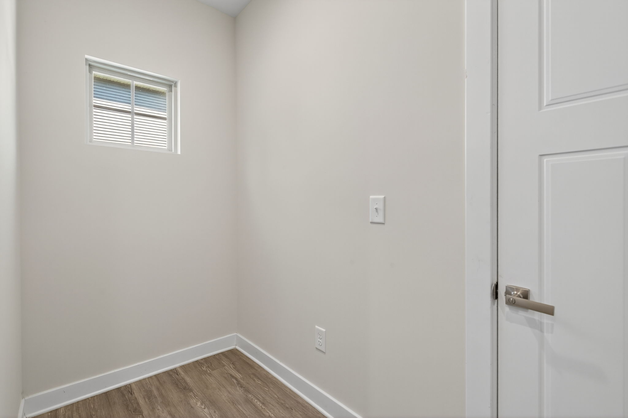 Useful drop zone space or pet area off garage