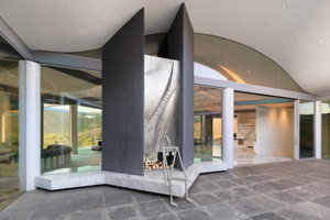 Artesian designed double sided fireplace (courtyard view)