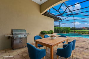 Covered Area On Pool Lanai virtually staged.jpeg