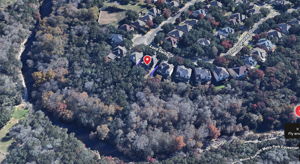 Location. Location. Location. Tucked in a wooded lovely neighborhood with no neighbors behind, and only 10 miles to Downtown Austin.