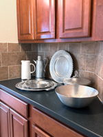 Another Fun Space ... a Butler's Pantry. This transitional space is between the kitchen and the dining room and can be used for storing your large kitchen items, staging meals, serving food, etc.