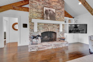 Stone Fireplace & Built-In Shelving
