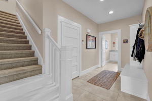 Mudroom, Laundry, & Stairs to 4th En Suite Bedroom
