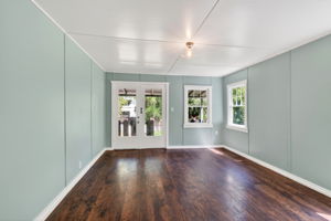 The living room looking towards the front porch.