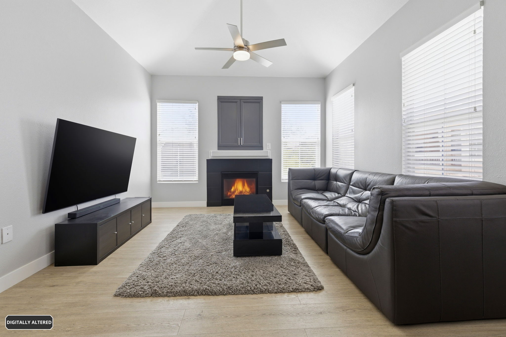 Custom built in storage over fireplace.