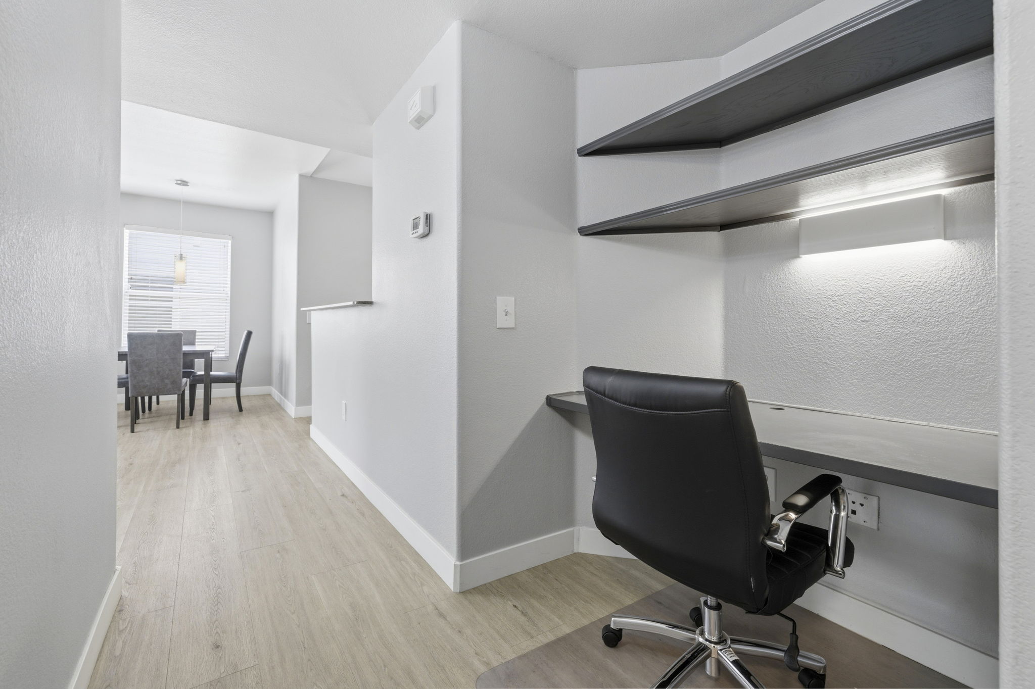 Built in work alcove with shelving.